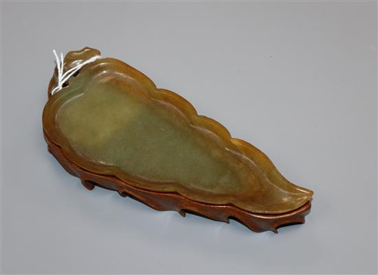 A Chinese jade leaf on stand